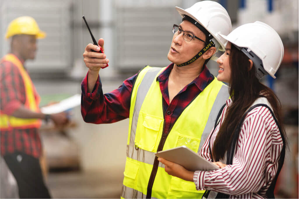 Man pointing out something to woman